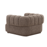 Lahti Armchair with modern cloud shape design, soft upholstery, and generously sized seating for comfort and style.